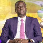 LE DG DE SÉNÉGAL NUMÉRIQUE CHEIKH BAKHOUM SORT DE SA RÉSERVE 3 polic.jpg